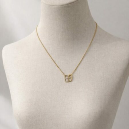 Collier acier doré INFINI